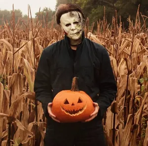 Michael Myers Holding Jack O Lantern Wallpaper