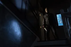Michael Myers Standingon Stairs Wallpaper