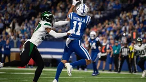 Michael Pittman Jr Catching Football Wallpaper