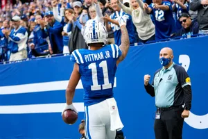 Michael Pittman Jr Celebratingwith Fans Wallpaper