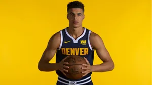 Michael Porter Jr Yellow Background Wallpaper