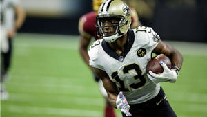 Michael Thomas Running With Ball Wallpaper