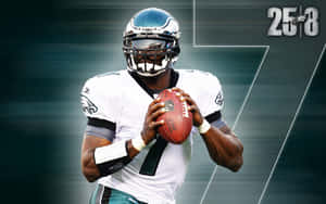 Michael Vick #7 Of The Philadelphia Eagles Endures A Crushing Tackle Wallpaper