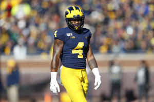 Michigan Football Player Nico Collins Number4 Wallpaper