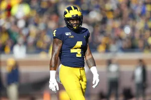 Michigan Football Player Nico Collins Number4 Wallpaper