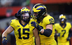 Michigan Football Players Alan Bowman And Nolan Knight Wallpaper