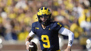 Michigan Quarterback Action Shot Wallpaper