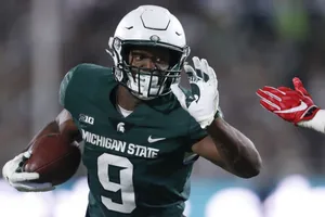 Michigan State Football Player Action Shot Wallpaper
