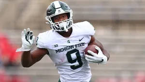 Michigan State Running Back Action Shot Wallpaper