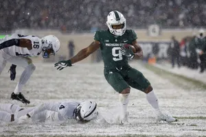 Michigan State Running Back Snow Game Wallpaper