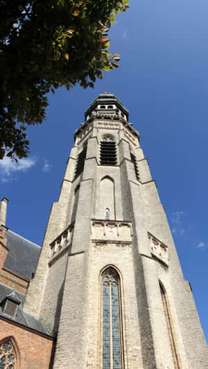 Middelburg Church Tower Against Blue Sky Wallpaper