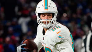 Mike Gesicki Miami Dolphins Game Action Wallpaper