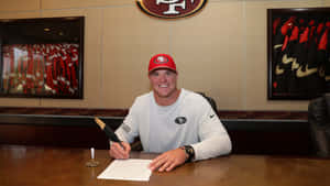 Mike Mcglinchey In Action During A Game Wallpaper