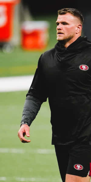 Mike Mcglinchey In Action During A Game Wallpaper