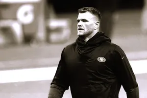 Mike Mcglinchey In Action During An Intense Football Game Wallpaper