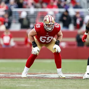 Mike Mcglinchey In Action During An Nfl Game Wallpaper