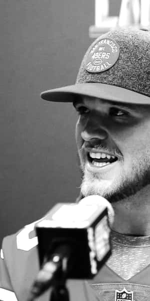 Mike Mcglinchey In Action During An Nfl Game Wallpaper