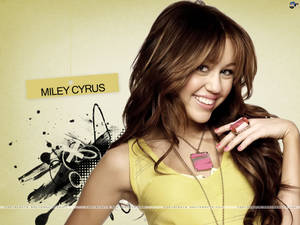 Miley Cyrus Doing What She Does Best: Entertaining Fans Wallpaper