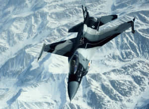 Military Plane On Snowy Mountains Wallpaper