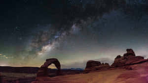 Milky Way Over Desert Arch Wallpaper