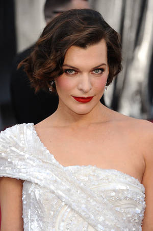 Milla Jovovich Actress White Gown Red Carpet Wallpaper