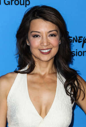 Ming Na Wen Posing Elegantly At An Event Wallpaper