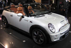 Mini Cooper S Convertible Cruising In Style Wallpaper