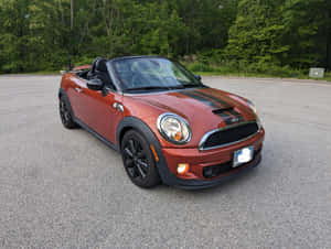 Mini Roadster Parked Outdoors Wallpaper