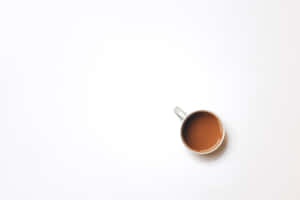 Minimalist Cupof Teaon White Background Wallpaper