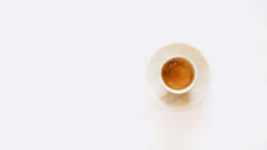 Minimalist Cupof Teaon White Background Wallpaper