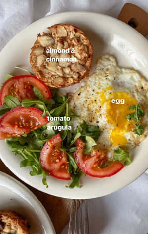 Minimalist Food – A Delectable Dish On A White Plate Wallpaper