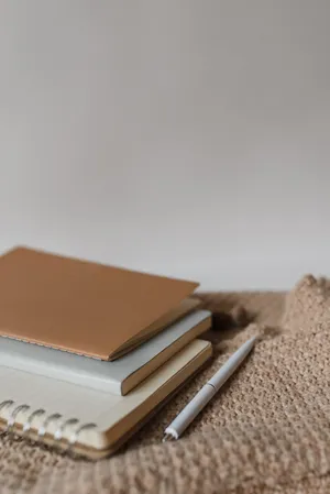 Minimalist Notebooksand Pen Wallpaper