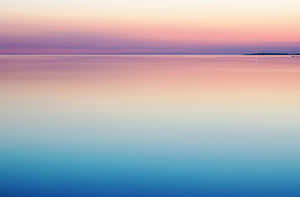 Minimalist Sunset Over Serene Waters Wallpaper