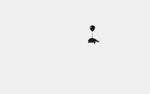 Minimalist_ Turtle_with_ Balloon Wallpaper