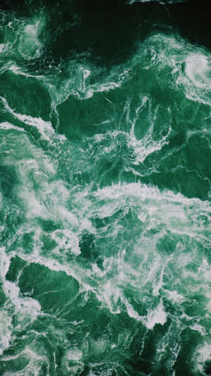 Mint Green Marble Wall With Unique And Intricate Patterns Wallpaper