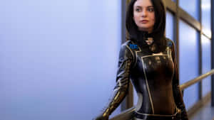 Miranda Lawson In A Striking Action Pose Wallpaper