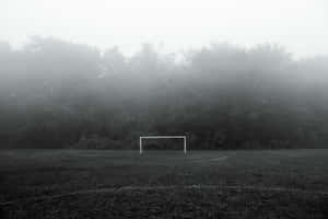 Misty Soccer Field Goal Post Wallpaper