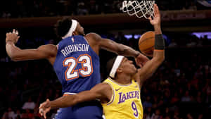 Mitchell Robinson Blocking Rajon Rondo Wallpaper