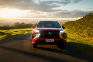 Mitsubishi Eclipse Cross Drivingat Sunset Wallpaper