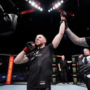 Mma Fighter Jack Shore Celebrating A Victory Wallpaper