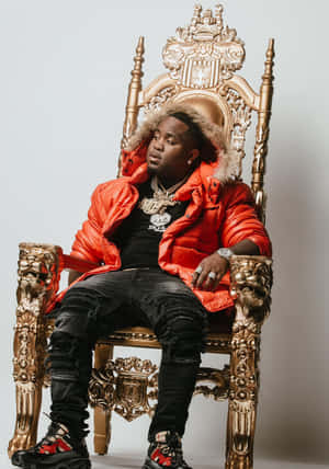 Mo3 Sitting On A Royal Chair Wallpaper