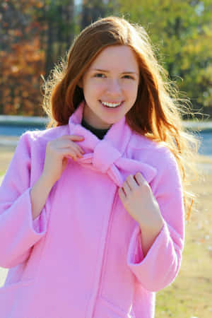 Model In A Stylish Pink Coat Wallpaper