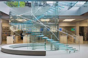Modern Apple Store Interiorwith Glass Staircase Wallpaper