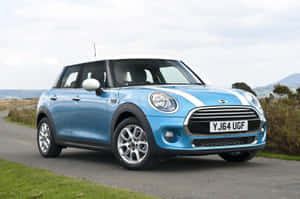 Modern Compact Car On The Road Wallpaper