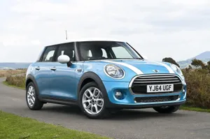 Modern Compact Car On The Road Wallpaper