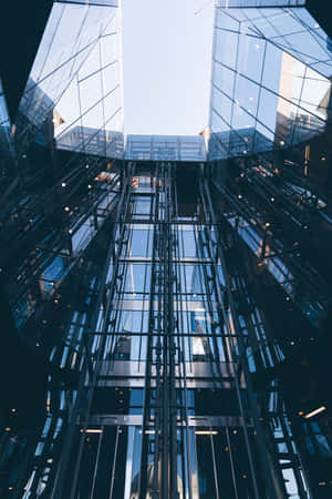 Modern Glass Architecture Skyward View Wallpaper