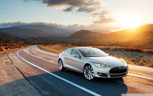 Modern Hybrid Car In Motion Wallpaper