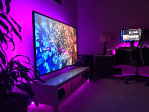 Modern Neon Lit Home Entertainment Setup Wallpaper