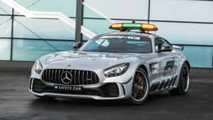 Modern Safety Car In Action On The Racetrack Wallpaper