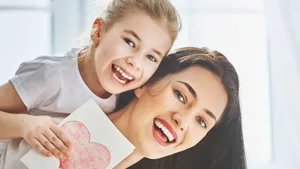 Mom Little Girl On Back Wallpaper